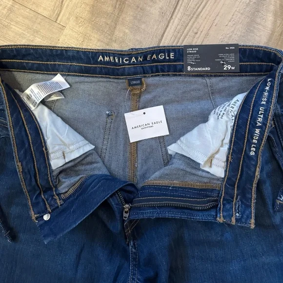 Women’s American Eagle Dreamy Drape Strigid Low Rise Ultra Wide-Leg Jeans - Picture 7 of 8